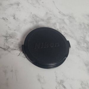 Nikon 52m. Camera Cap